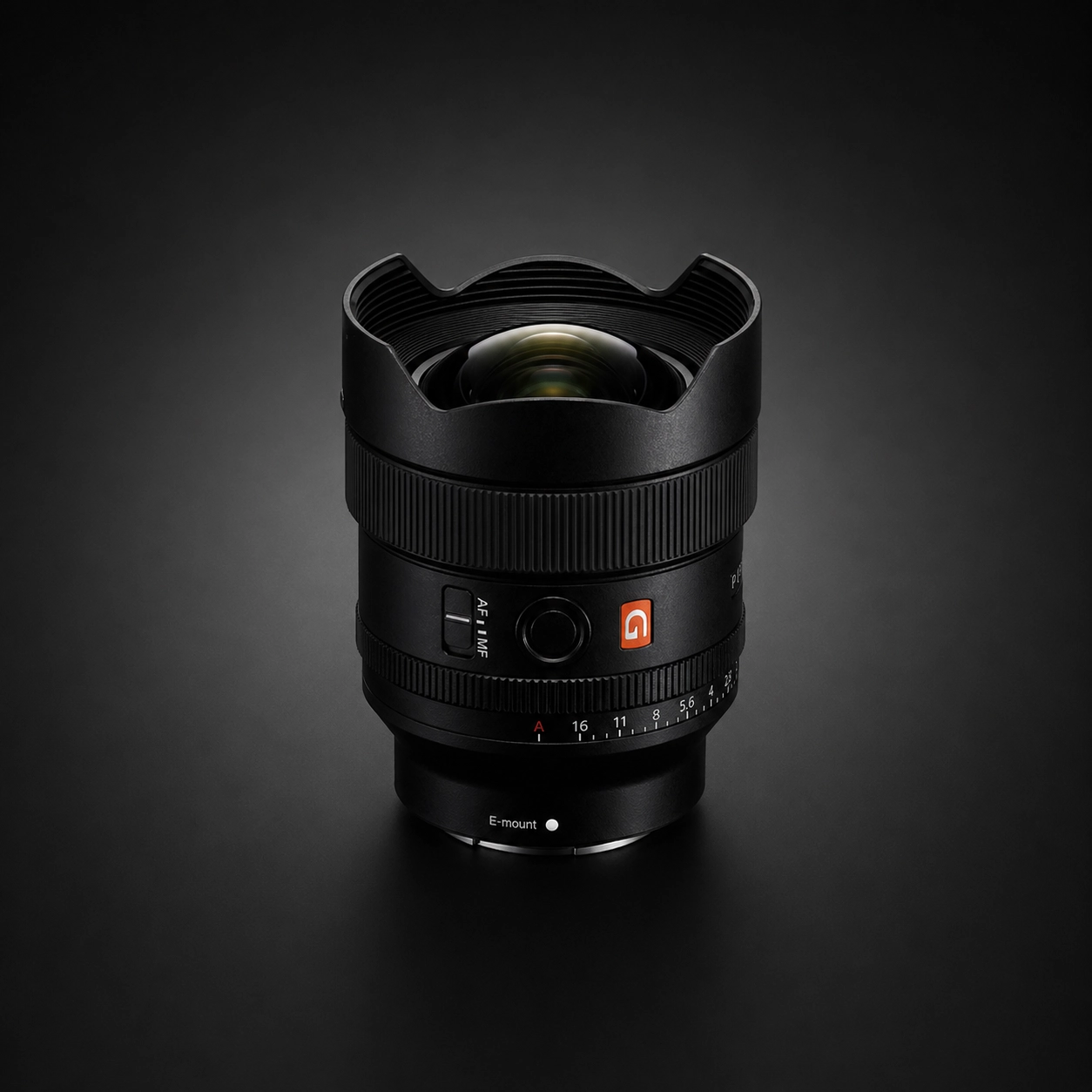 Sony FE 14mm f1.8 G Master lens on a black background.